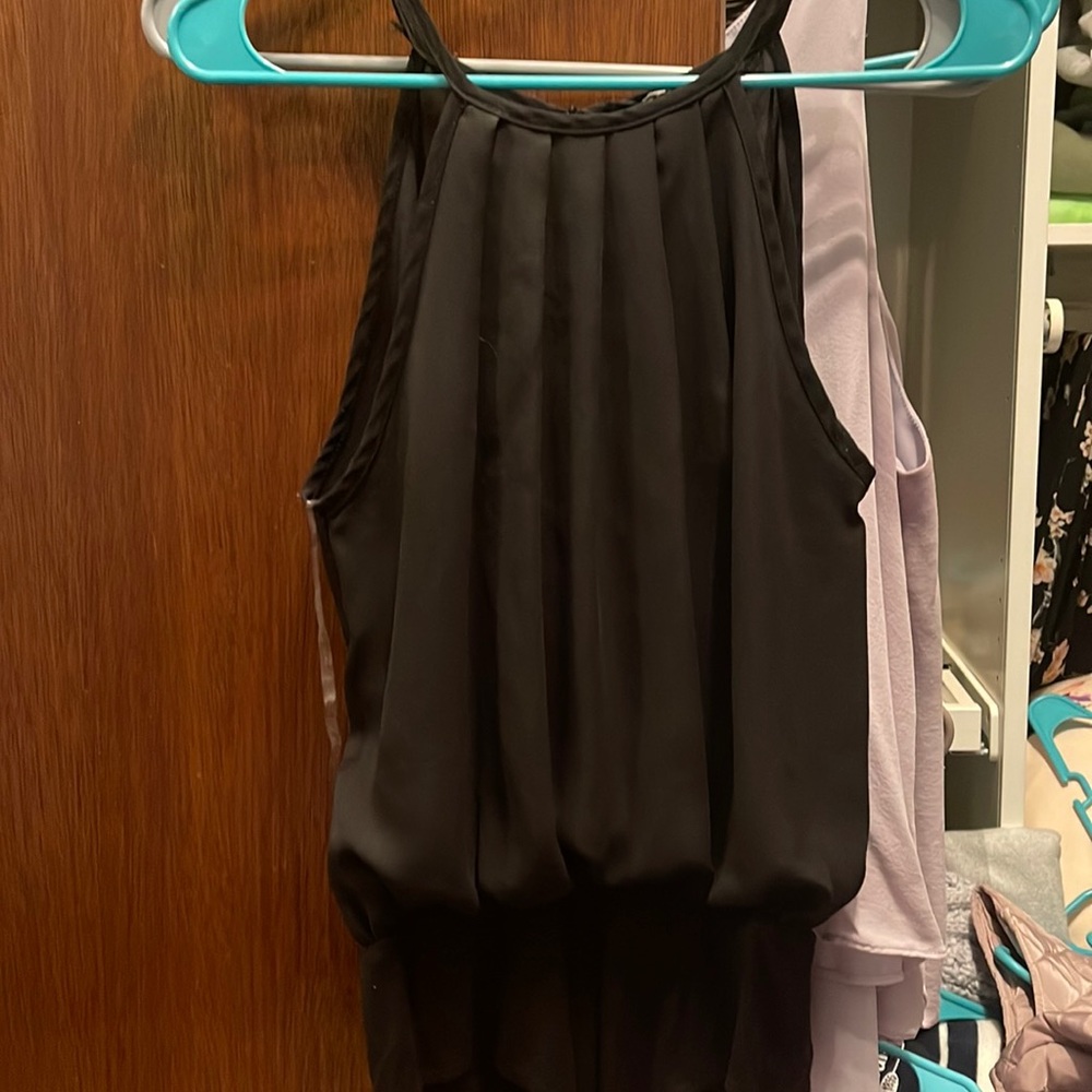 Black dressy body suit. Back has a slit all the way down. Size medium